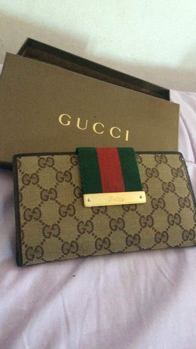 Portafogli e borsellini da donna Gucci marrone 